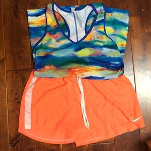 Exercise outfit—Nike shorts and FILA tank.